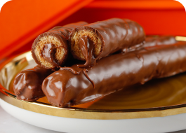 Canudinho de Chocolate - Canudinhos crocantes recheados com Avelã, oferecendo uma combinação perfeita de textura e sabor.